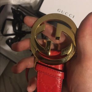 Red Gucci belt gold buckle